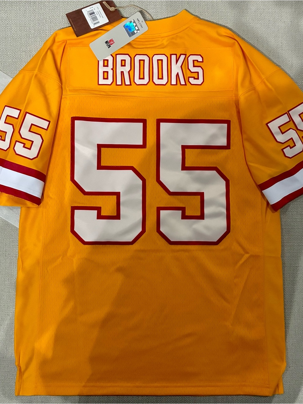 Mitchell & Ness Brooks #55 Yellow Football Jersey with White and Red Trim